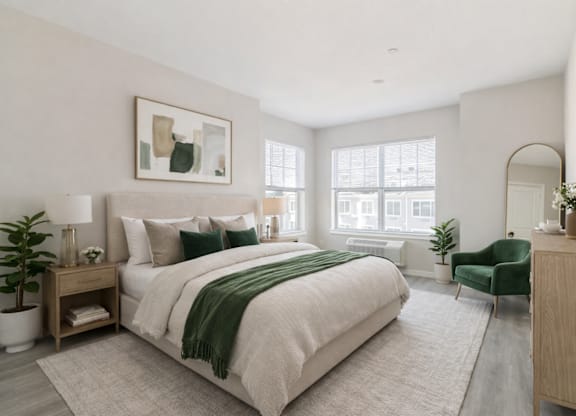 Spacious bedroom with large windows at The Rail North Bergen luxury apartments