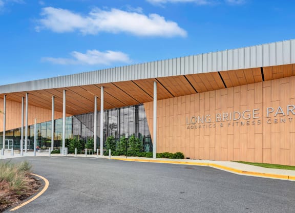a large building with the long bridge park logo on it