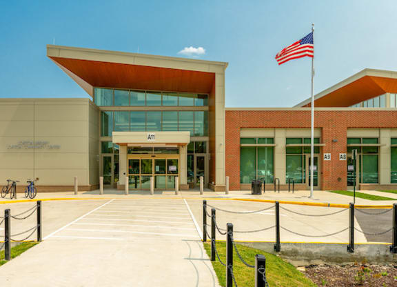 a building with an american flag in front of it
