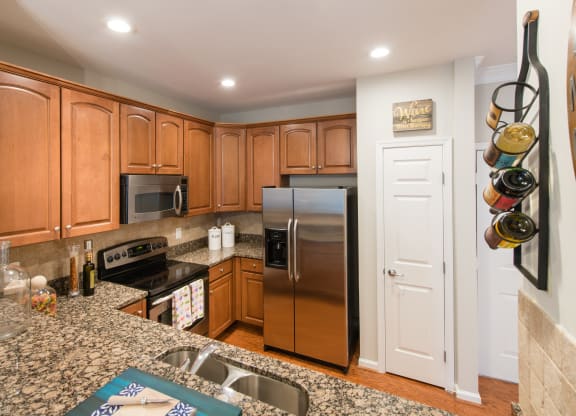 Plenty of storage space in designer kitchens at The Cosmopolitan at Lorton Station, Lorton, VA