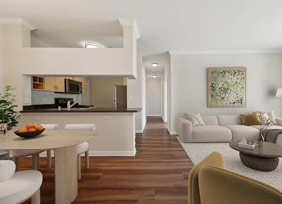 A modern kitchen with a dining table and chairs.