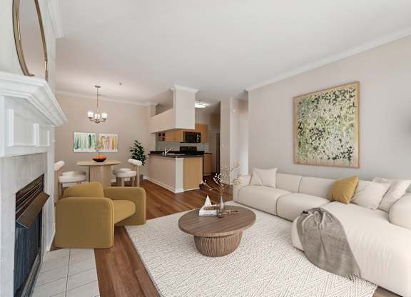 A living room with a white couch and a coffee table.