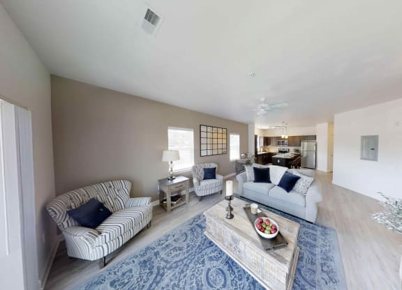 a living room with two couches and a coffee table