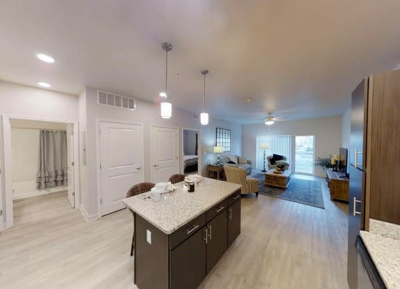 a kitchen and living room in a new home