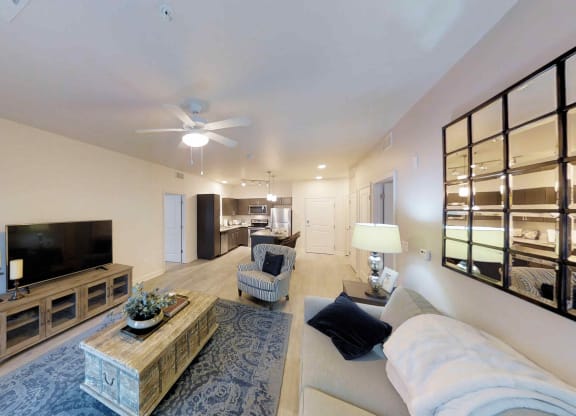 a living room with a couch and a tv