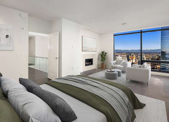 A penthouse bedroom with a view of Bellevue at Two Lincoln Tower.