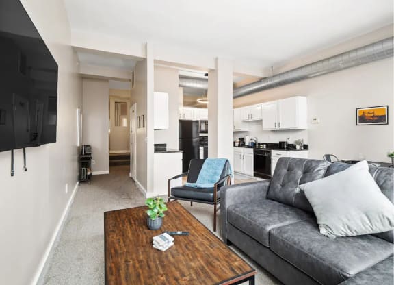 a living room with a couch and a coffee table