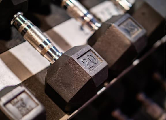 a close up of a piece of metal on a chess board