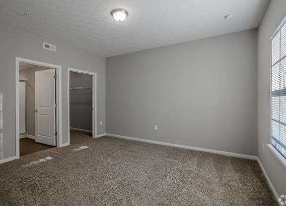 Carpeted Bedroom at The Residences at Akita Lane, Canal Winchester Ohio
