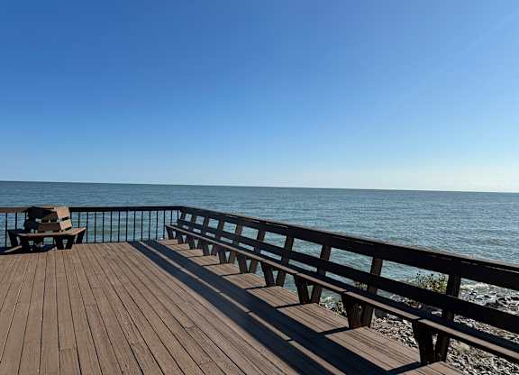 A wooden deck overlooks Lake Erie