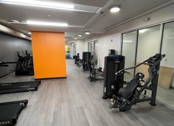a room filled with lots of exercise equipment