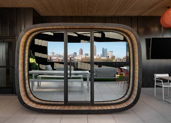A modern balcony with a view of the city skyline at The Park Apartments, Cleveland 44113