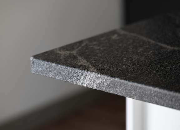 A close up of a black granite countertop at The Park Apartments, Cleveland , OH
