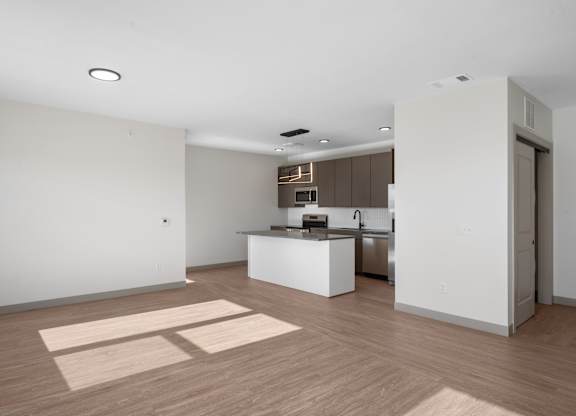 A kitchen area with a sink and a counter at The Park Apartments, Cleveland
