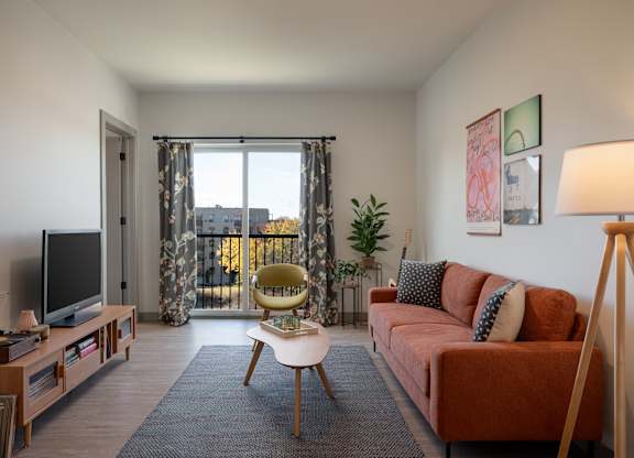 A living room with a television at The Park Apartments, Cleveland , Ohio
