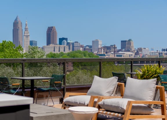 a rooftop deck with a view of the philadelphia skyline at TREO Apartments, Cleveland, OH