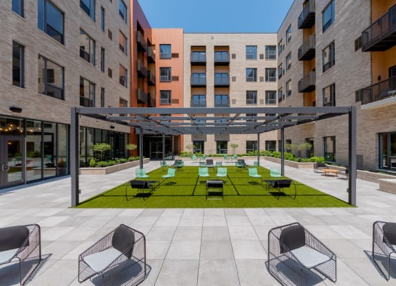Courtyard with seating area at TREO Apartments, Cleveland, OH
