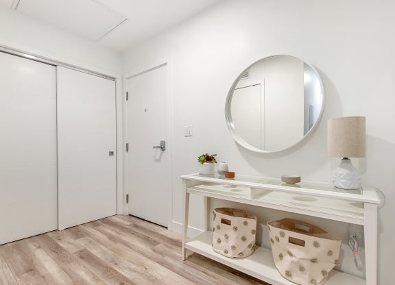 a bathroom with a vanity and a mirror