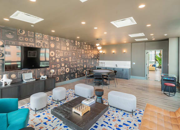 Media and Game Room with Poker Table and Arcade Games at One East Harlem Luxury Apartments in East Harlem, NY