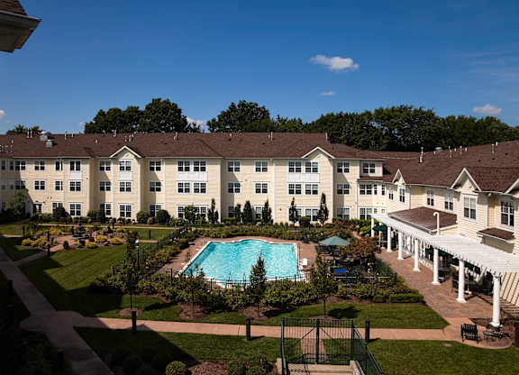 Garden Courtyard and Pool View at The Kentshire Senior Apartments in Midland NJ