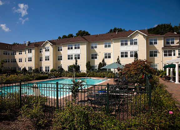 Garden Courtyard and Pool View at The Kentshire Senior Apartments in Midland NJ