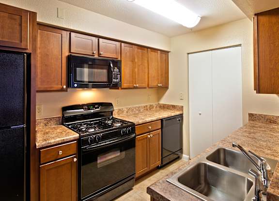 Apartment Kitchen at Timberleaf Affordable Apartments in Orlando, Florida