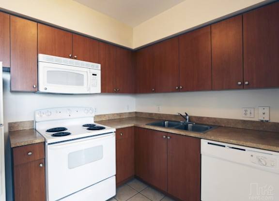 Kitchen at Poinciana Grove Senior Apartments in Miami FL