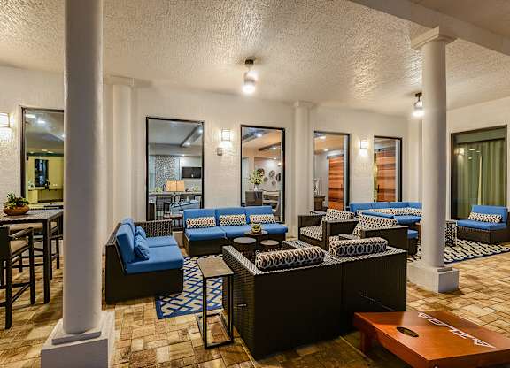 Outdoor patio seating area at Azura in Kendall, FL