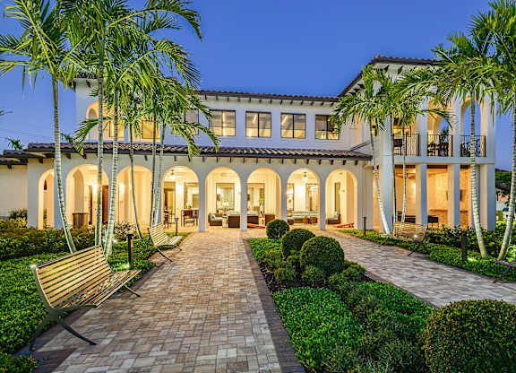 Lush landscaping and well maintained exterior homes at Azura in Kendall, FL