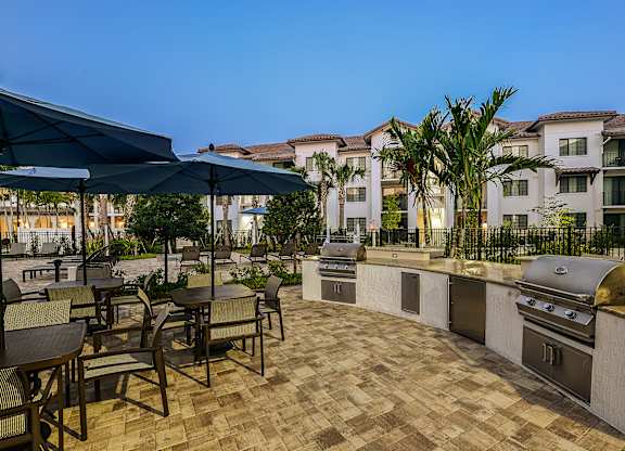Summer kitchen with BBQ grills at Azura in Kendall, FL