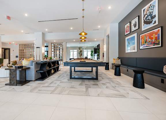 Clubhouse with Billiards at Marquee Square Apartments in Tampa, FL