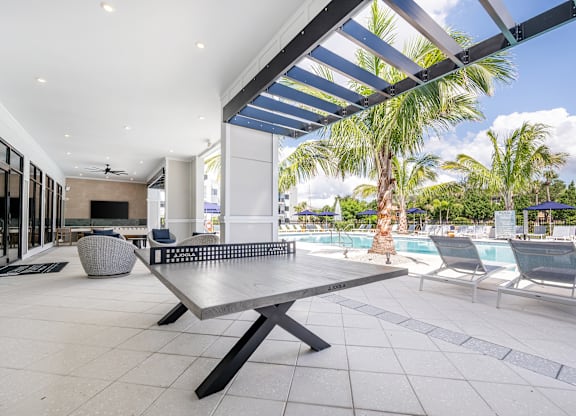 Poolside Lounge at Marquee Square Apartments in Tampa, FL