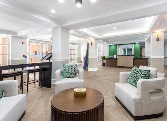 Club Room with Lounge Seating at Grand Plaza Senior Apartments in Los Angeles, CA