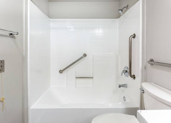 Bathrooms with Grab Bars at Grand Plaza Senior Apartments in Los Angeles, CA