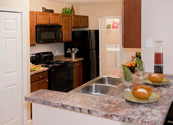 Kitchen at Grand Reserve Apartments in Zephyrhills, FL