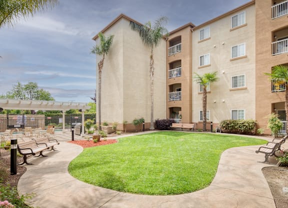 Courtyard with Grassy Area at Hayward Village Senior Apartments in Hayward CA