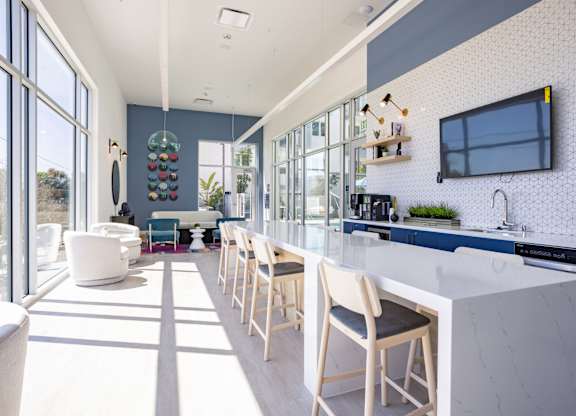 Expansive resident lounge overlooking the pool deck at Chandler Apartments in North Hollywood, North Hollywood, 91601