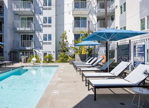 Enjoy the sunshine poolside at Chandler Apartments in North Hollywood, North Hollywood, CA, California