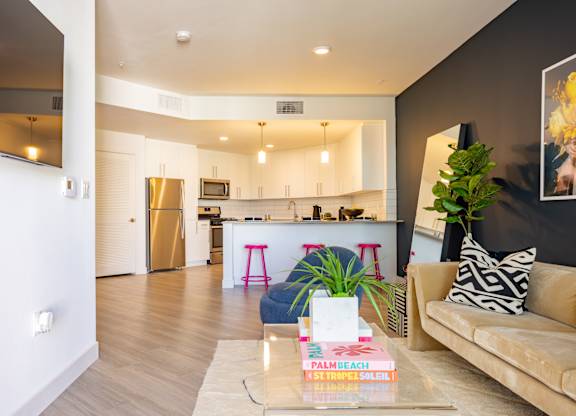 Open concept layout with rich finishes at Chandler Apartments in North Hollywood, North Hollywood, CA