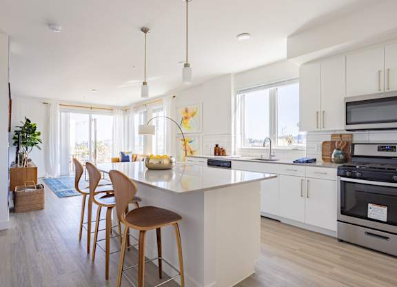 Bright kitchen with large island at Chandler Apartments in North Hollywood, North Hollywood, California