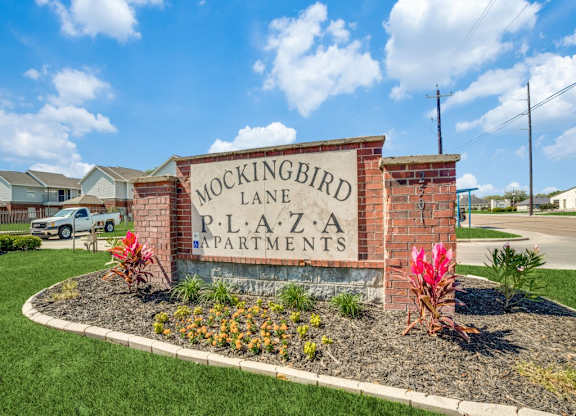 Entrance sign at Mockingbird Lane Plaza Affordable Apartments in Victoria TX