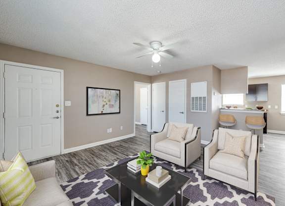 our living room and dining room are equipped with couches and chairs and a table
