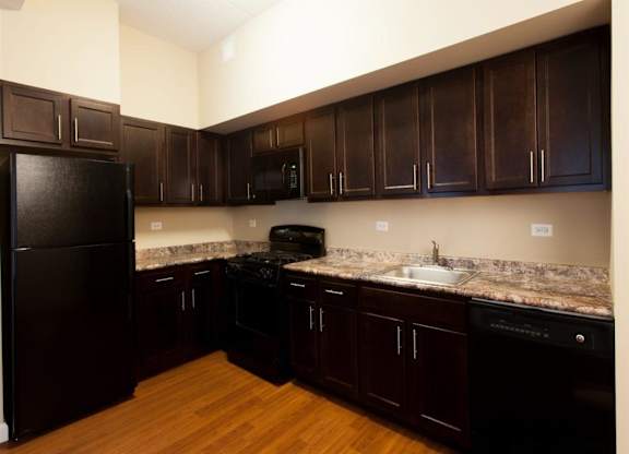 Kitchen at St. Nicholas Park Affordable Apartments in New York, New York