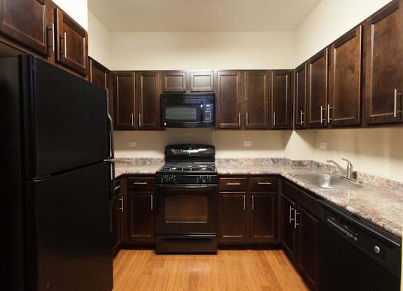 Kitchen at St. Nicholas Park Affordable Apartments in New York, New York