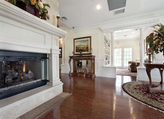 Fireside Seating at Spring Manor Senior Apartments in Poughkeepsie, NY