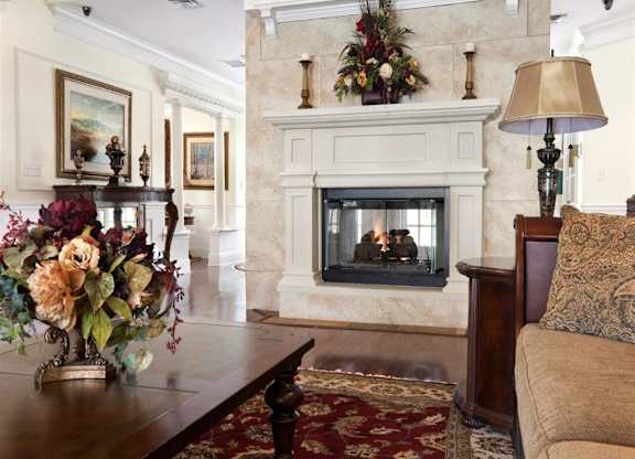 Fireside Seating at Spring Manor Senior Apartments in Poughkeepsie, NY