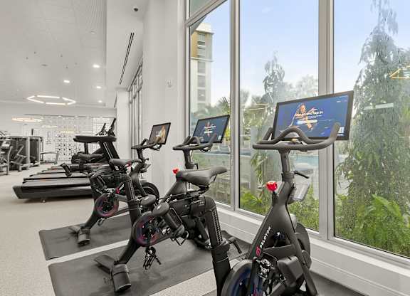 24/7 Fitness Center with Peloton Bikes at The Marc Luxury Apartments in Palm Beach Gardens FL