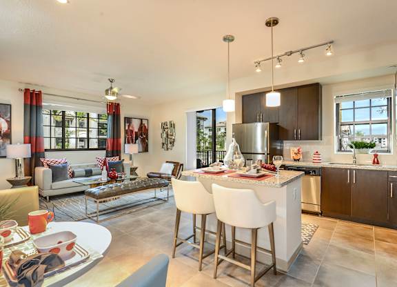 Stylish kitchen with stainless steel appliances at Palm Ranch Apartments in Davie, FL