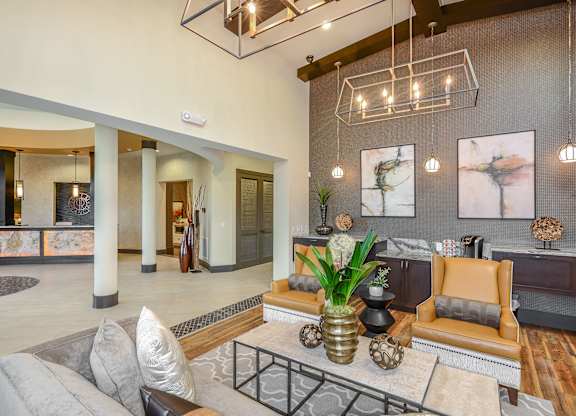 Relaxing resident lounge area in the clubhouse at Palm Ranch Apartments in Davie, FL