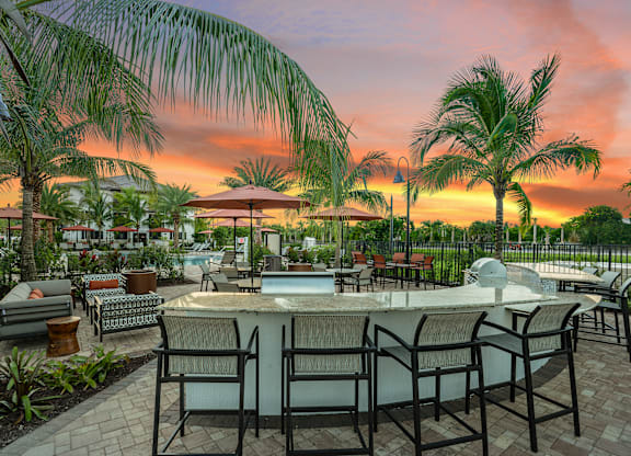 Resort-style outdoor kitchen at Palm Ranch Apartments in Davie, FL